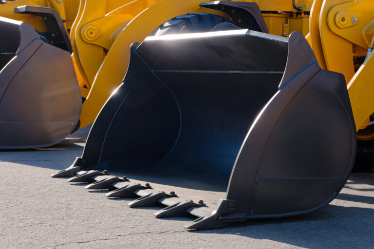 Construction machinery, digging bucket of an excavator, loader or bulldozer.