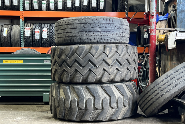 stack-of-tires-stacked-in-a-workshop-setting-2024-01-06-04-15-34-utc